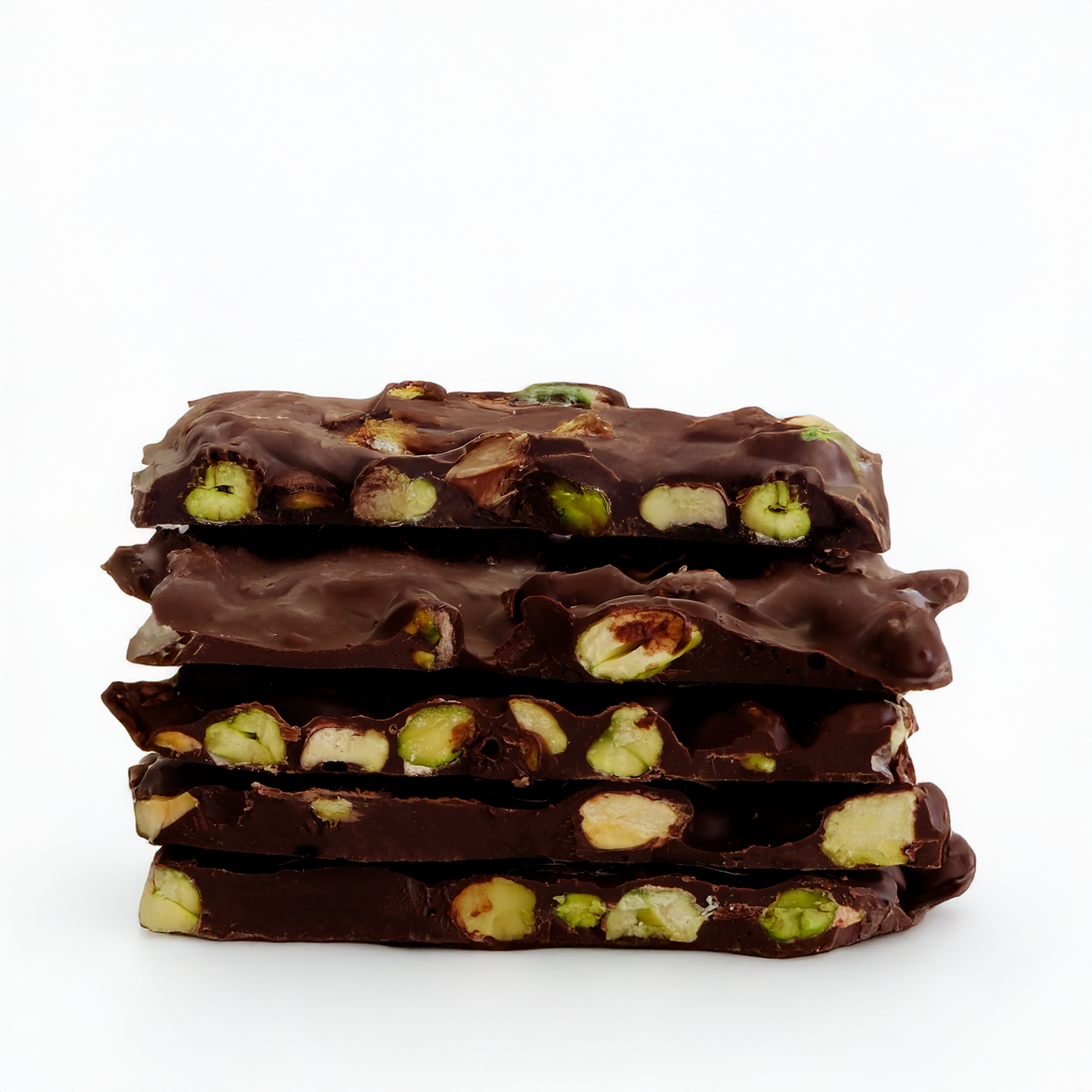 Stack of chocolate bars with nuts on a white background