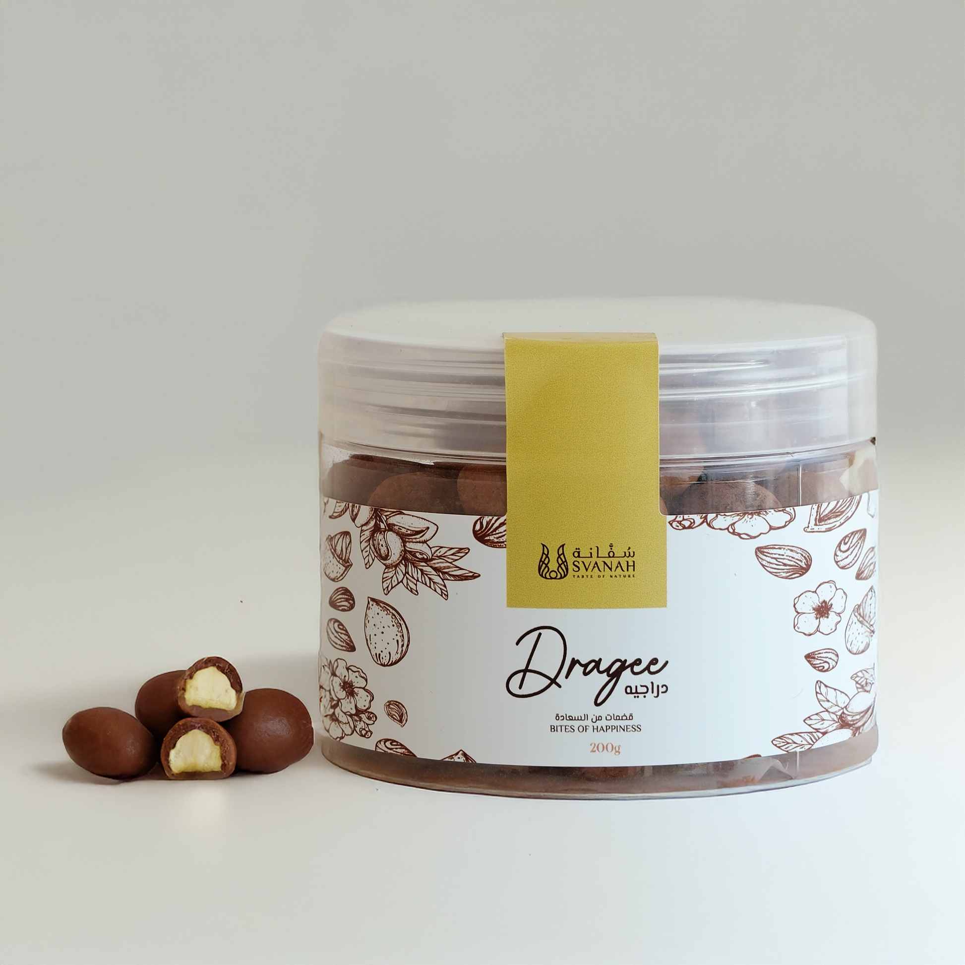 Jar of dragees with a yellow label on a light background