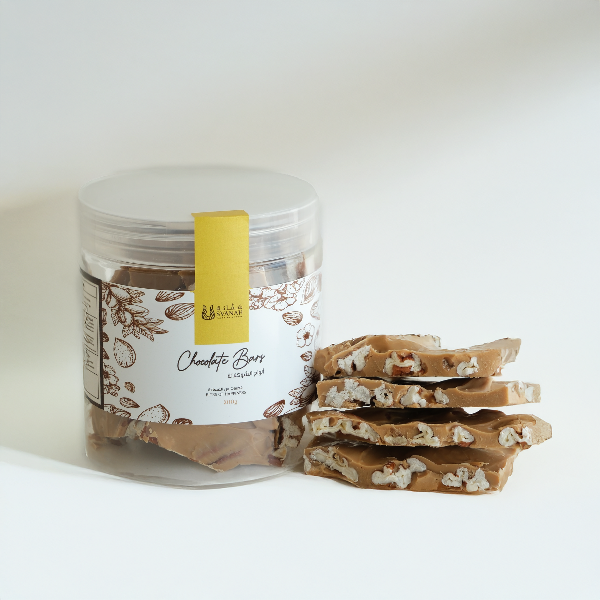 Jar of chocolate bars with a stack of broken chocolate pieces on a white background