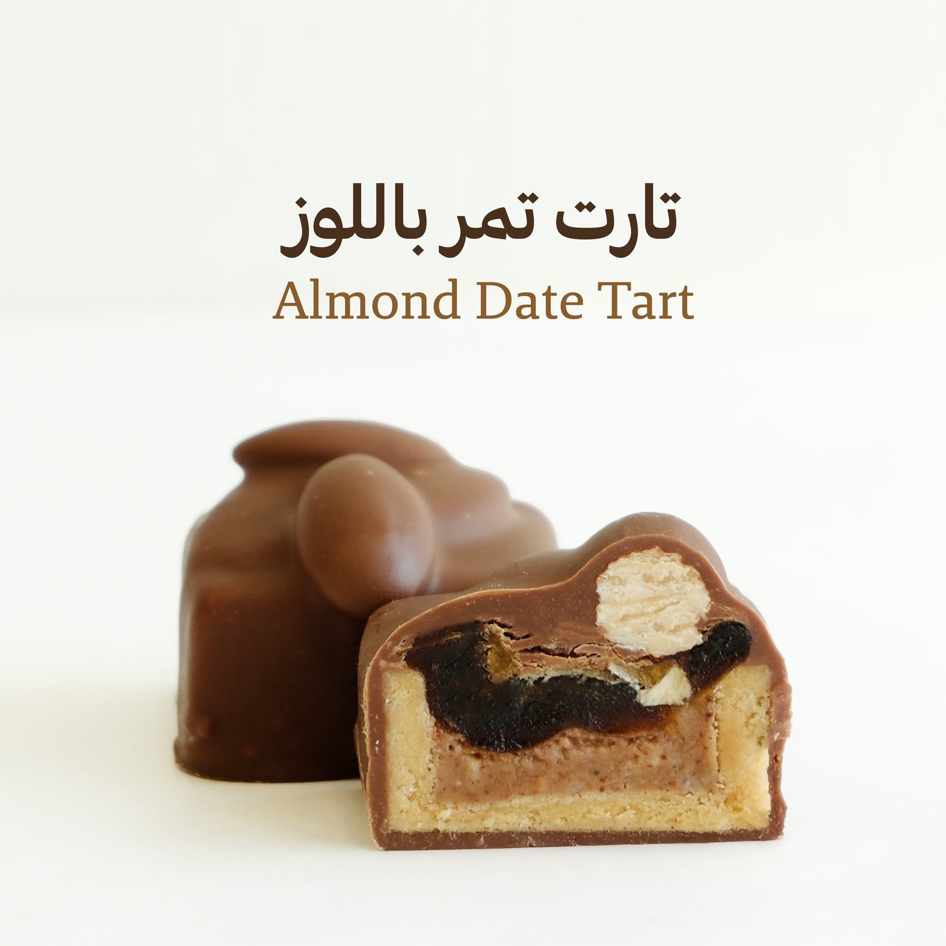 Almond Date Tart with chocolate shell on a white background