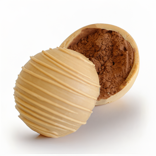 Chocolate truffle with a textured shell on a white background