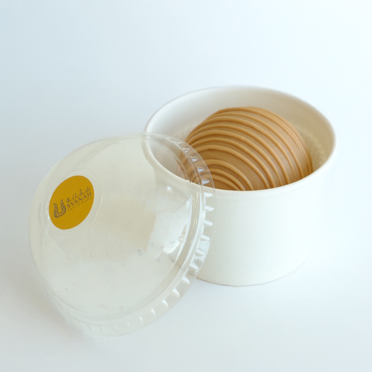 White container with a yellow label on a white background
