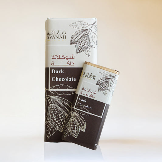 Two Svanah dark chocolate bars on a white background